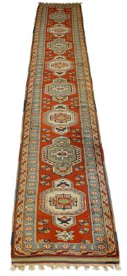 Lot 514 - A MIDDLE EASTERN POLYCHROME RUNNER with a banded border