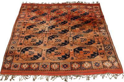 Lot 546 - A MIDDLE EASTERN RED GROUND SMALL CARPET with three rows of five octagonal motifs and all over styli