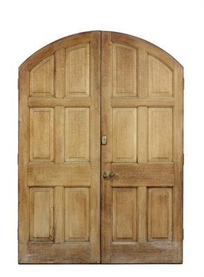 Lot 613 - A PAIR OF VICTORIAN OAK ARCHING FRONT DOORS with fielded panels