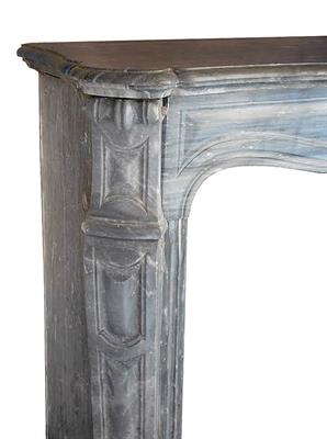 Lot 623 - A FRENCH GREY MARBLE FIRE SURROUND with serpentine mantlepiece and carved panelled support 117cm wid