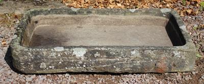 Lot 631 - A LARGE ANTIQUE STONE SHALLOW TROUGH or sink