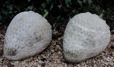 Lot 657 - A PAIR OF RECONSTITUTED STONE GIANT STRAWBERRIES 32cm wide x 31cm high