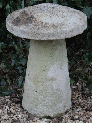 Lot 661 - A  CAST COMPOSITE STADDLE STONE 66cm high x 43cm diameter