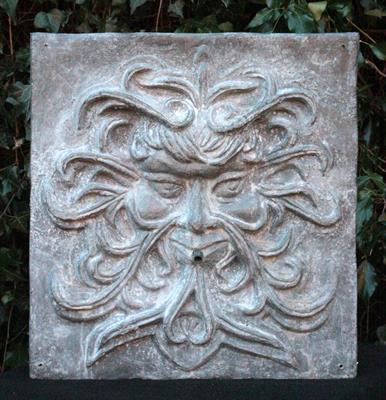 Lot 677 - A LARGE LEAD GREEN MAN FOUNTAIN MASK with copper spout 41cm high