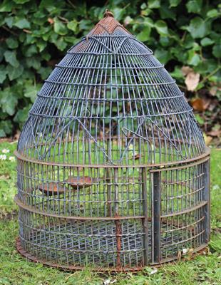 Lot 697 - A CYLINDRICAL WIREWORK BIRD CAGE with domed top