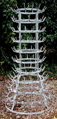 Lot 708 - A FRENCH GALVANISED TEN TIER CIRCULAR BOTTLE DRYING RACK on a spreading base 112.5cm high overall