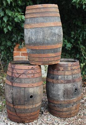 Lot 709 - A GROUP OF THREE OLD SMALL BARRELS the largest approximately 54cm high (3)