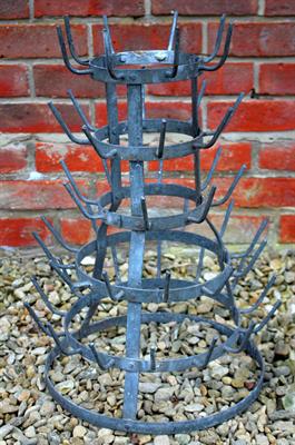 Lot 710 - A FRENCH GALVANISED FIVE TIER BOTTLE TREE OR DRYER with a spreading circular base 57cm high overall