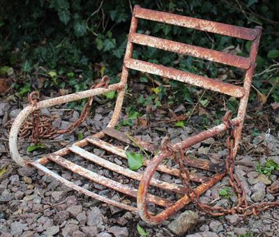 Lot 721 - A WHITE PAINTED WROUGHT IRON CHILD'S SWING SEAT with suspension chains 37cm wide