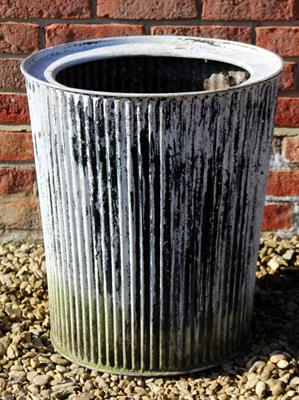 Lot 734 - AN OLD GALVANISED FLUTED WASHING TUB 48cm in diameter x 54cm high