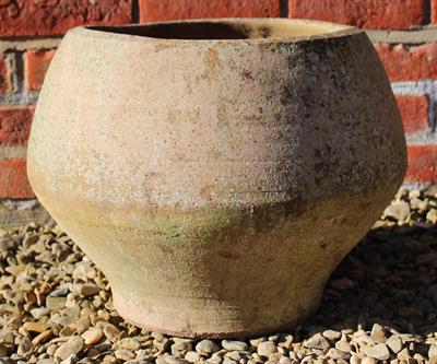 Lot 748 - AN OLD TERRACOTTA OVOID PLANTER 41cm diameter x 34cm high