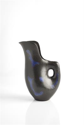 Lot 19 - Geoffrey Eastop (British, 1921-2014)
Jug, circa 1992
thrown and altered black stoneware, sprayed and