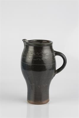 Lot 44 - Michael Casson (British, 1925-2003)
Jug
salt glazed, incised decoration
impressed potter's seal
23