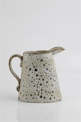 Lot 67 - ‡Emmanuel Cooper (British, 1938-2012)
Jug
white volcanic pitted glaze
impressed potter's seal
20cm