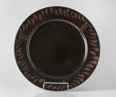 Lot 85 - David Lloyd Jones (British, 1928-1994)
Charger
decorated in temoku with foliate motif to