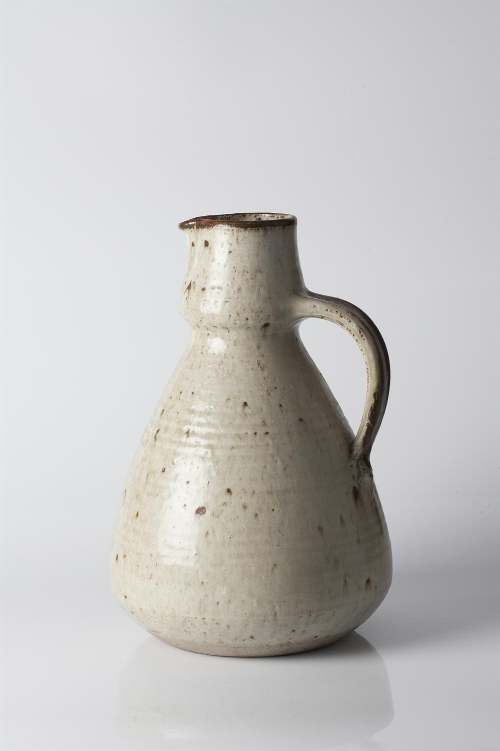 Lot 101 - Barbara Cass (British, 1921-1922)
Jug
speckled iron glaze
incised potter's mark and 'Arden'
34cm