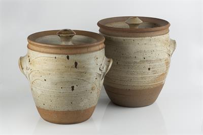 Lot 113 - Michael Casson (British, 1925-2003)
Two storage pots
oatmeal glaze
each impressed potter's