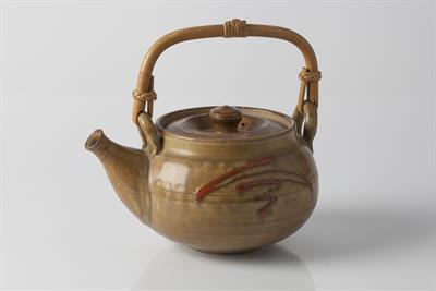 Lot 149 - Shigeo Shiga (Japanese, 1928-2011)
Teapot
iron red brushwork motif, cane handle
impressed potter's