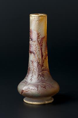 Lot 170 - Daum of Nancy
'Chardons' vase, circa 1900-1910
enamelled and acid etched yellow glass
signed 'Daum