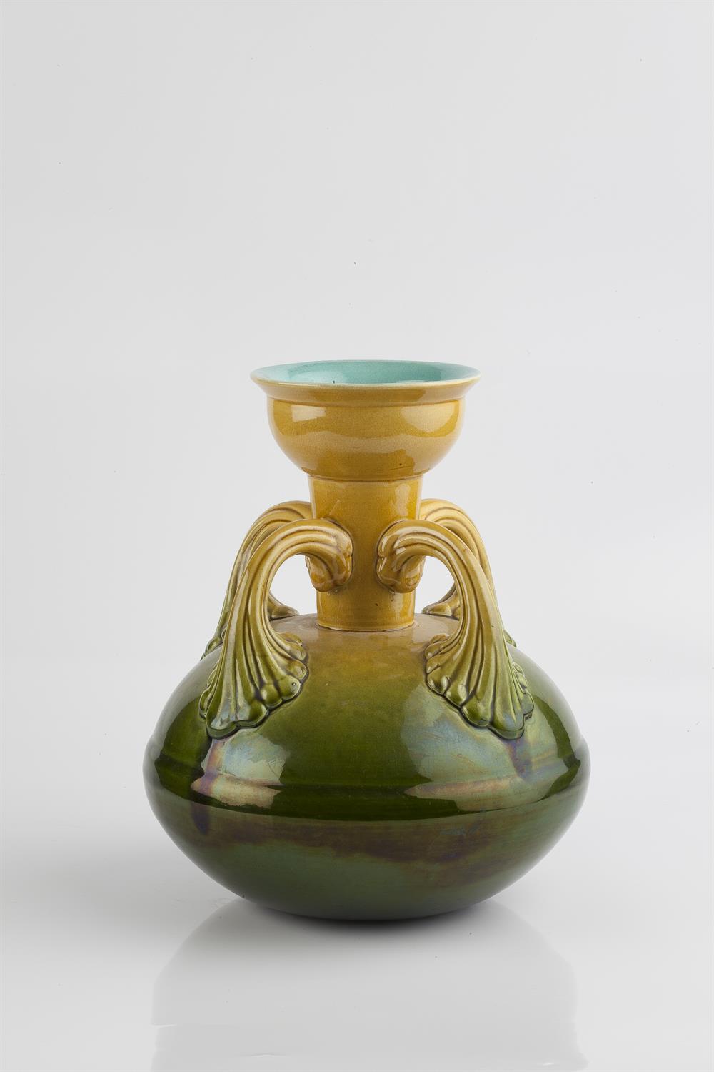Lot 184 - Christopher Dresser (British, 1834-1904) for Ault
Vase, circa 1890
four sinuous handles, yellow to
