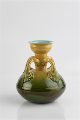 Lot 184 - Christopher Dresser (British, 1834-1904) for Ault
Vase, circa 1890
four sinuous handles, yellow to