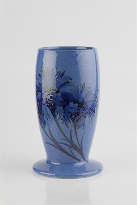 Lot 194 - William Moorcroft (British, 1872-1945)
'Cornflower' vase, 1928
underglaze blue signature and dated