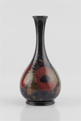 Lot 196 - William Moorcroft (British, 1872-1945)
'Pomegranate' vase
underglazed green signature and stamped