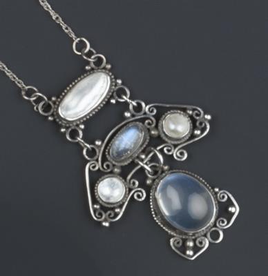 Lot 228 - Arts & Crafts 
Moonstone and blister pearl pendant, circa 1910-1915
scrolled wirework and beaded