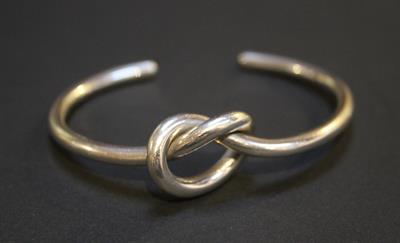 Lot 237A - Andreas Mikkelsen (Danish, 1928-2008) for Georg Jensen
'Knot' silver bangle 
numbered A44B
signed