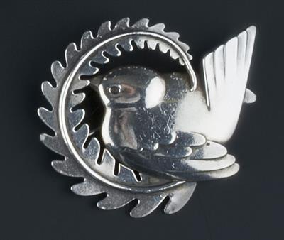 Lot 250 - Arno Malinowski (1899-1976) for Georg Jensen
Brooch
depicting a wren enclosed by a curved