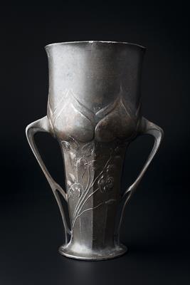 Lot 257 - Orivit
Secessionist pewter vase
decorated with flowers and hearts and with two sinuous