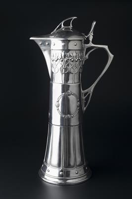 Lot 259 - WMF
Secessionist pewter flagon
with floral and foliate stylised decoration
stamped maker's mark and