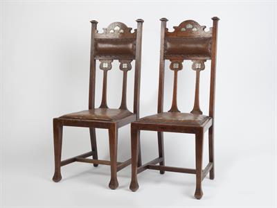 Lot 302 - Manner of Harvey Ellis (American, 1852-1904)
Pair of Art Nouveau oak chairs
inlaid with pewter and