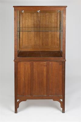 Lot 323 - Hugh Birkett (British, 1919-2002)
Cotswold School oak display cabinet
the lower half with panelled