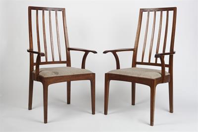 Lot 324 - Edward Barnsley Workshop
Pair of Cotswold School armchairs, circa 1970s
possibly walnut, with shaped