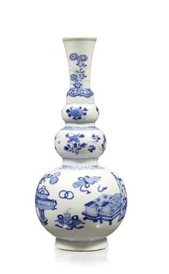 Lot 11 - A Chinese blue and white triple gourd bottle vase