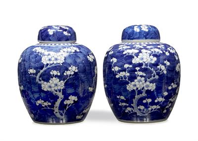 Lot 16 - A pair of Chinese blue and white ginger jars and covers