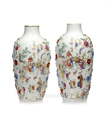 Lot 86 - A pair of Chinese white ground porcelain vases