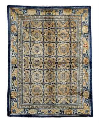 Lot 104 - A Chinese silk rug