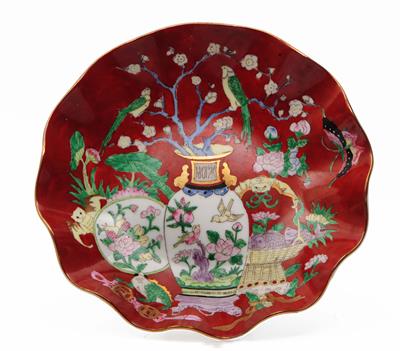 Lot 125 - A Chinese red ground dish