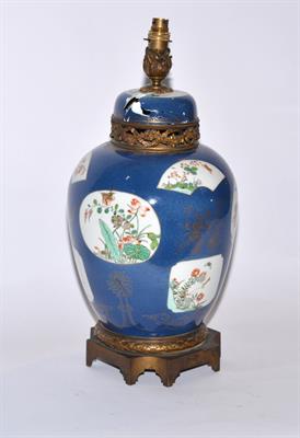 Lot 141 - A Chinese powder blue and famille verte vase and cover