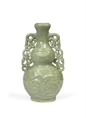 Lot 154 - A Chinese celadon double gourd vase