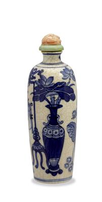 Lot 155 - A Chinese blue and white decorated soft paste cylindrical snuff bottle