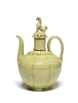 Lot 160 - A South East Asian pale celadon ewer and cover