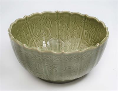 Lot 174 - A Chinese celadon deep bowl