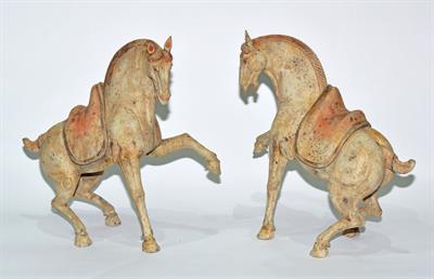 Lot 175 - A pair of Chinese pottery horses