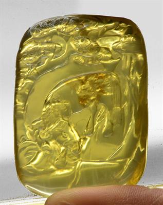 Lot 187 - A Chinese rectangular pale yellow tourmaline pendant