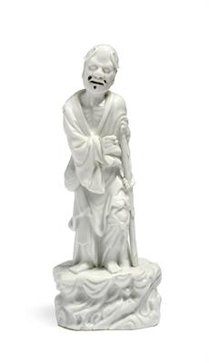 Lot 211 - A Chinese blanc de chine standing figure of Immortal Li Tieguai