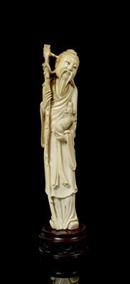 Lot 214 - A Chinese ivory figure of an Immortal