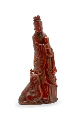 Lot 242 - A Chinese carved buffalo horn figure of Quanyin